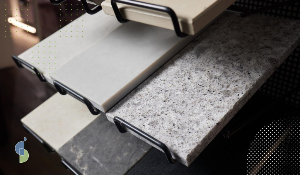 Muestras de materiales para mesones flotantes de cocina: granito, cuarzo y piedra sinterizada